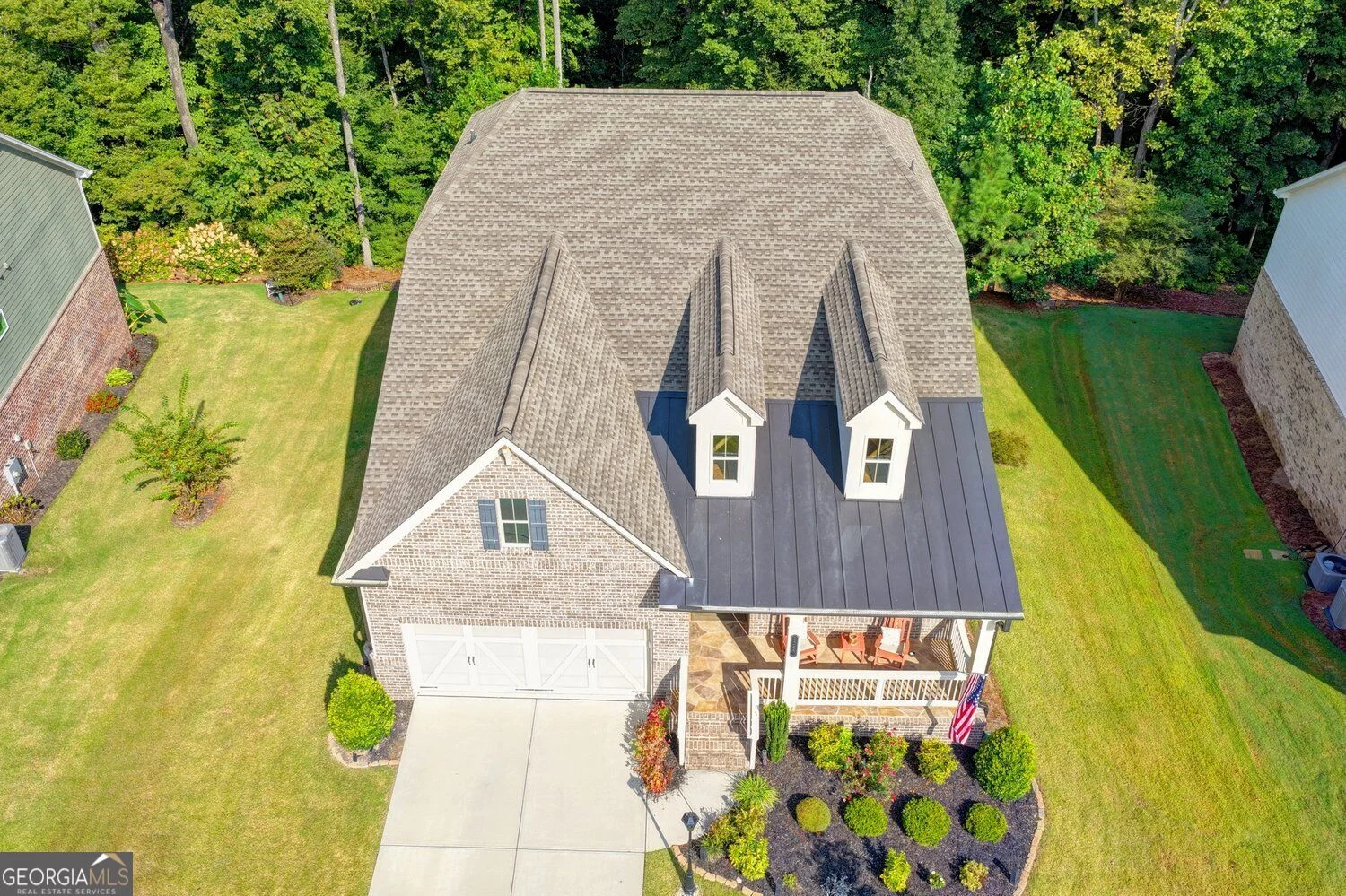 Aerial view of the home and neighboring homes