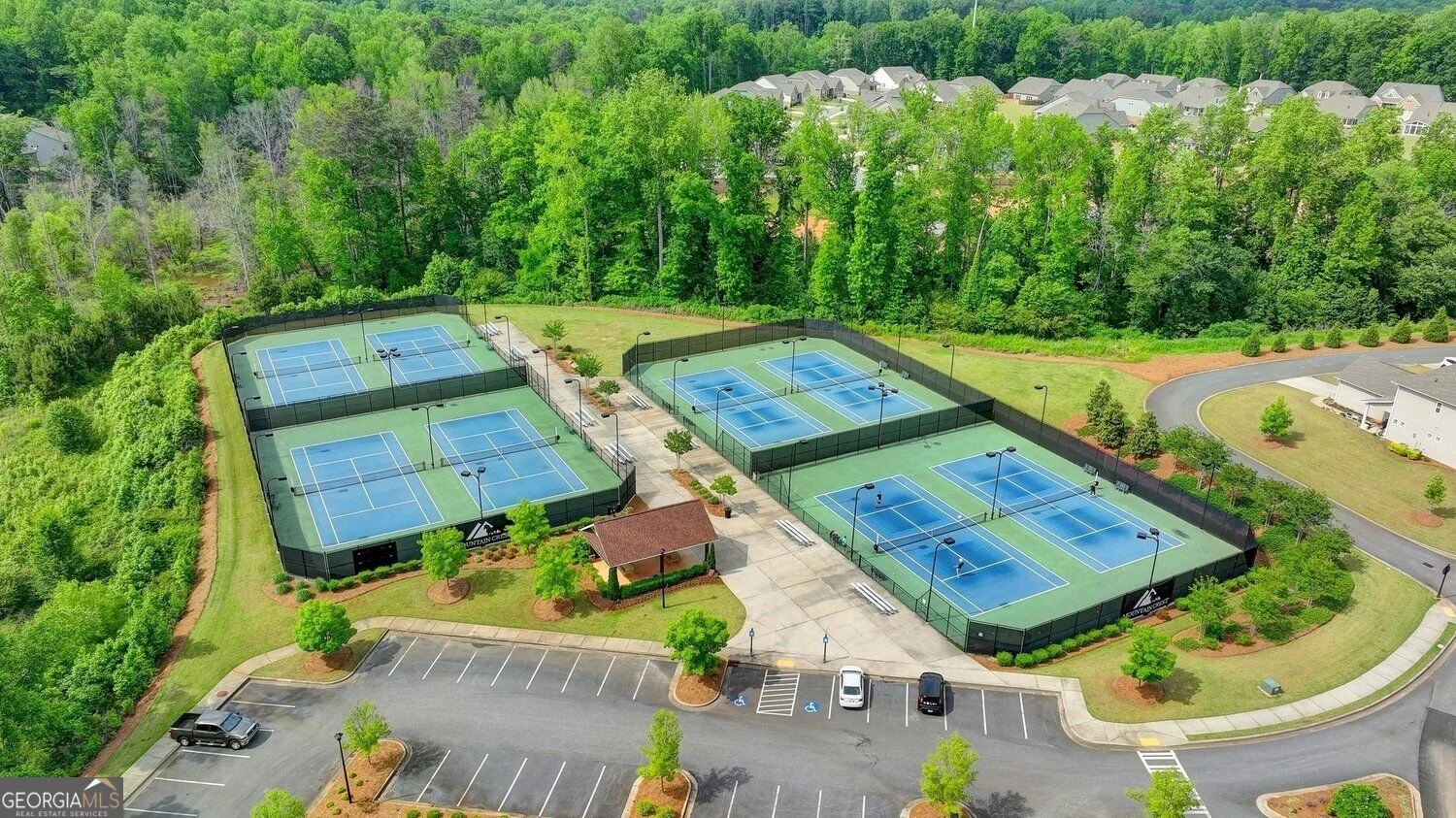 Shared community tennis and pickleball courts