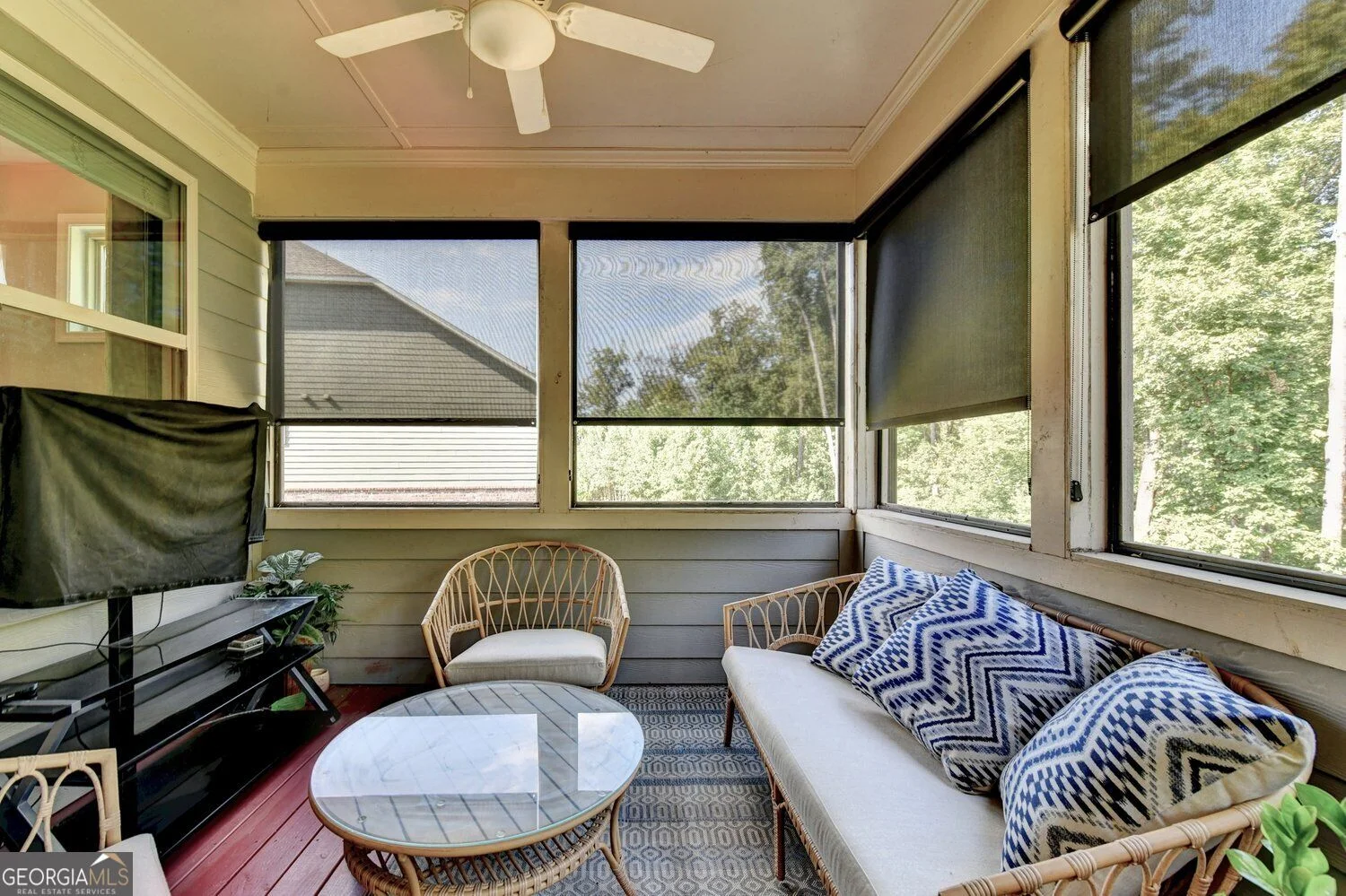 Seating on the screened rear porch